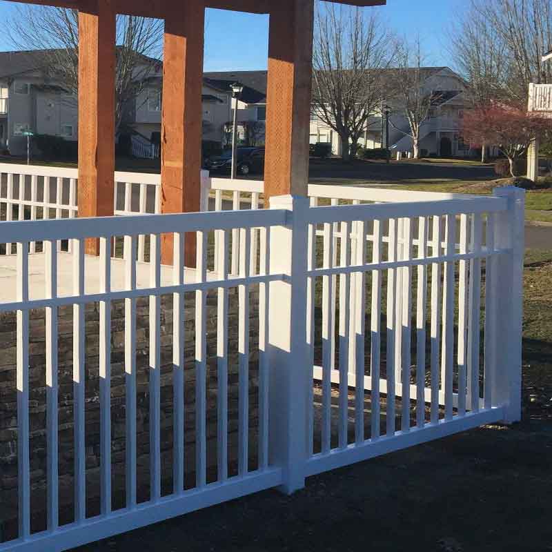 white vinyl fence