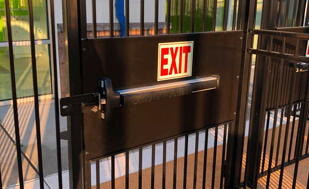Iron security gate with panic bar