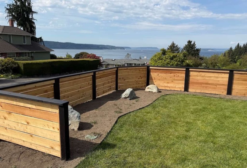 wood fence installation overlooking the puget sound